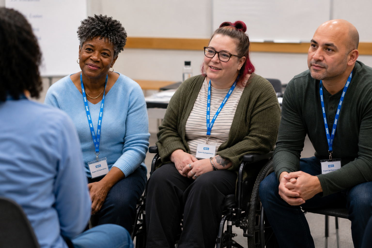 Experts by Experience listening in a group discussion